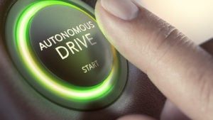 Autonomous Driving Stocks, A finger hovering over an "autonomous drive" button.