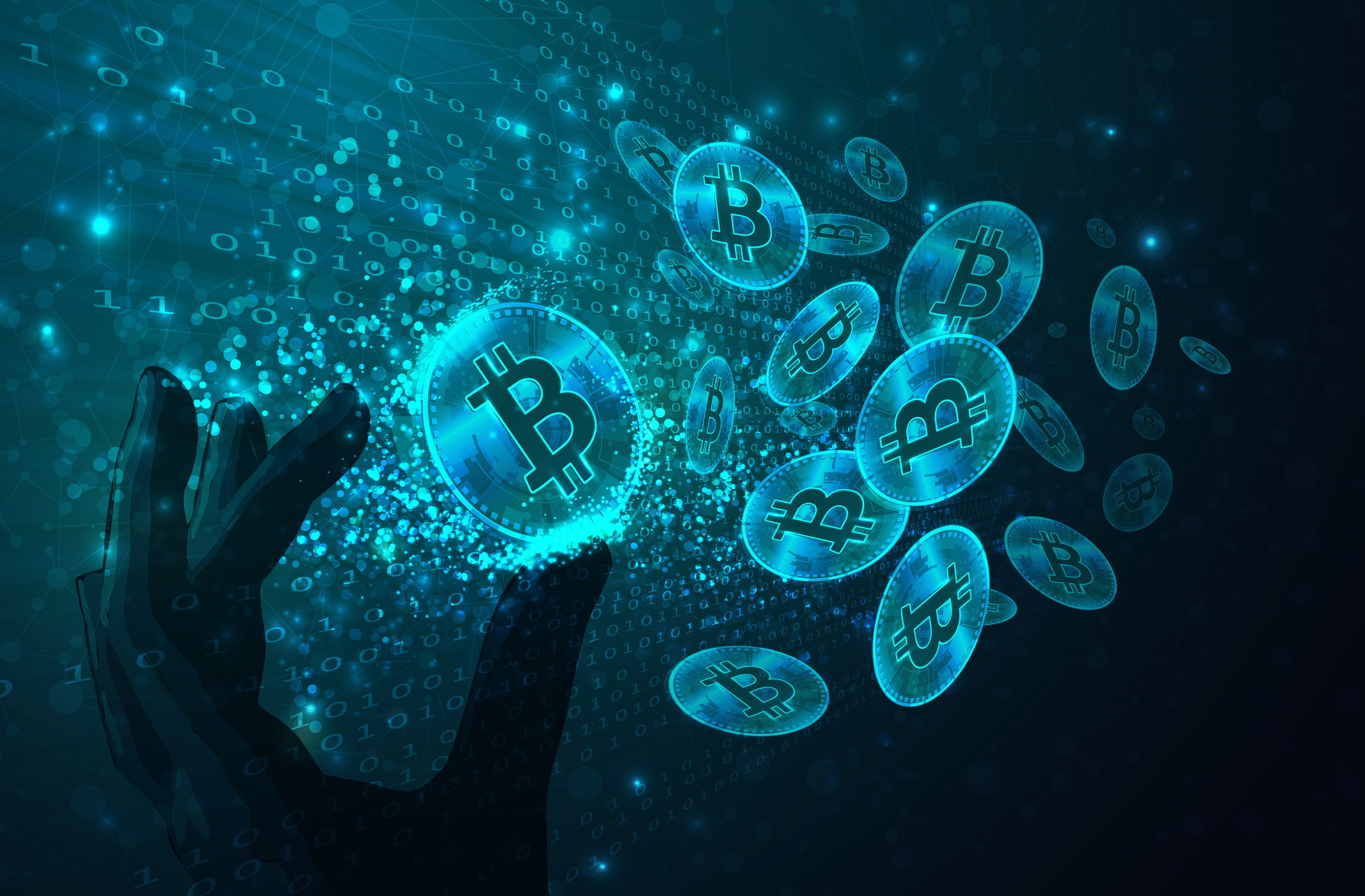 A digital rendering of a hand grabbing one of several Bitcoin tokens.