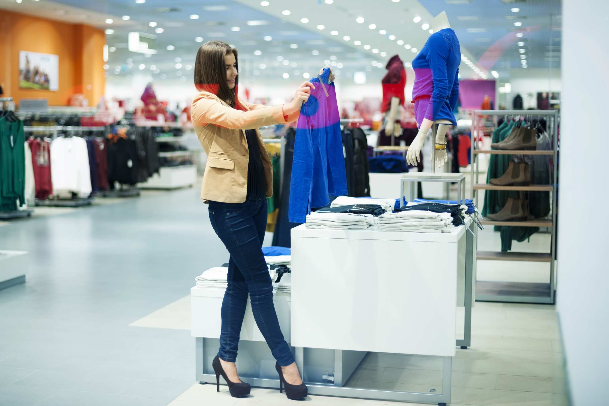 Customer shops for clothes.