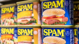 Grocery shelf of SPAM cans made by Hormel (HRL)