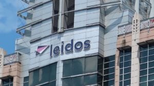 Leidos (LDOS) logo on the side of an office building