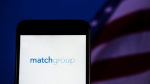 mobile phone screen displaying match group's (MTCH stock) logo