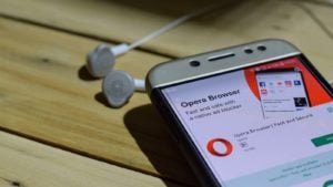 A phone displaying the Opera (OPRA) app