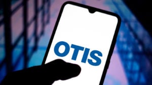 momentum stocks: a smartphone screen displaying the Otis Worldwide (OTIS) logo