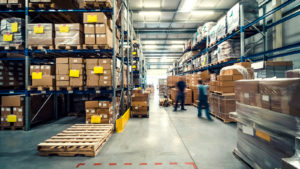 stocks to buy: warehouse interior with shelves, pallets and boxes D