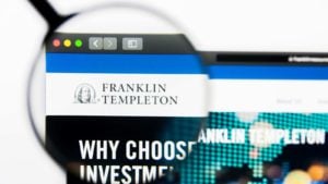 A magnifying glass zooms in on the website for Franklin Resources (BEN).