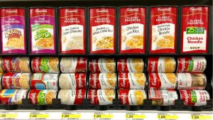A variety of Campbell's soups in a grocery store. CPB stock.