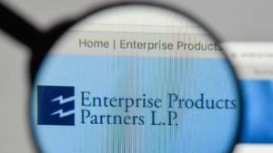 A magnifying glass zooms in on the website of Enterprise Product Partners (EPD)