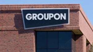 a building sports a sign bearing the Groupon (GRPN) logo