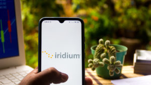 the Iridium Satellite Communications logo seen displayed on a smartphone