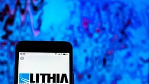 Lithia Motors Retail company logo seen displayed on smart phone. stocks to buy