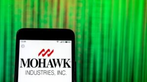 Mohawk (MHK) logo on an iphone screen with a green background