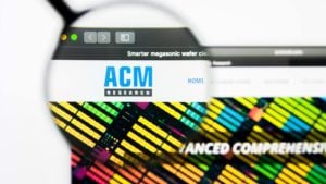 a magnifying glass enlarges the ACM logo on a website. Russell 2000 Stocks