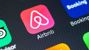 Airbnb (ABNB) app on a smartphone screen