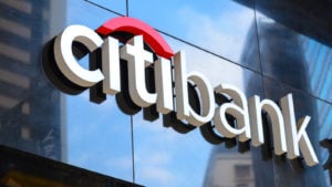 A Citibank (C) sign hangs on a Citibank office in Hong Kong. Citigroup layoffs