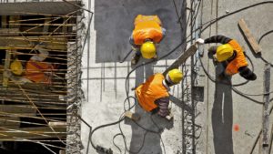 An image of construction workers on a building construction site.