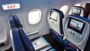 Inside the airplane cabin of a Delta flight.