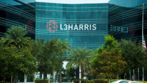 An office building with the logo for L3Harris Industries visible on the building.