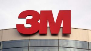 3M logo on top of a corporate building. MMM stock