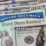 social-security-card-with-hundred-dollar-bills