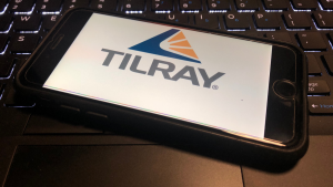 Close view of Tilray (TLRY) logo on a smart phone. Tilray specializes in cannabis research, cultivation, processing and distribution. TLRY stock