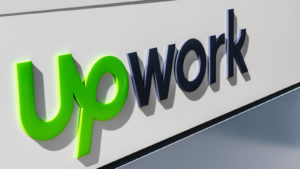 upwork (UPWK) logo on a building