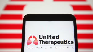 In this photo illustration United Therapeutics Corporation (UTHR) logo is seen on a mobile phone screen.