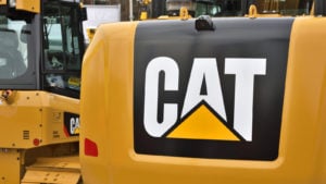 Image of a yellow construction vehicle with the Caterpillar (CAT) logo on it