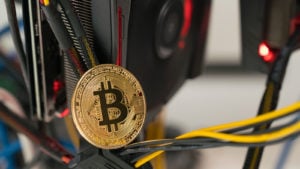 a bitcoin concept coin sitting on wires