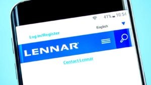 Lennar (LEN) website homepage. Lennar logo visible on the phone screen
