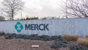 A photo of a large concrete Merck & Co Inc (MRK) sign outside a building.