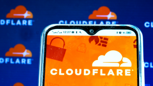 In this photo illustration a Cloudflare Inc (NET) logo is seen displayed on a smartphone. stocks to sell on the CPI report