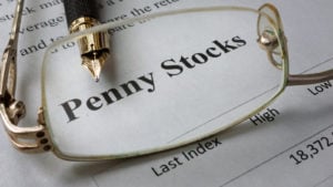 Page of newspaper with words penny stocks. Undervalued Penny Stocks