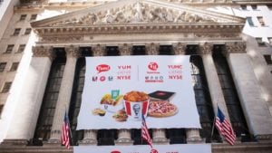 A banner for Yum China (YUMC) decorates the New York Stock Exchange.