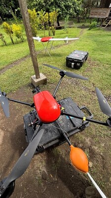 Geoscan's 401 quadcopter drone with the Geoshark magnetometer, and fixed wing UAV (on stand) capturing high-resolution orthomosaic imagery and topography. (CNW Group/Adyton Resources Corporation)