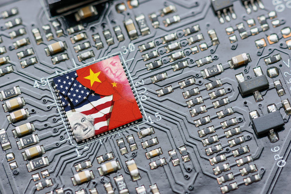 A microchip featuring U.S. and Chinese imagery.