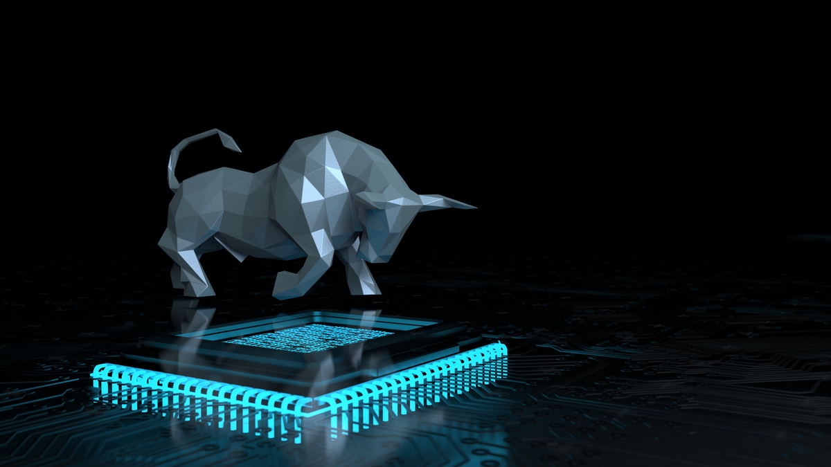 A model of a bull on top of a computer processor.