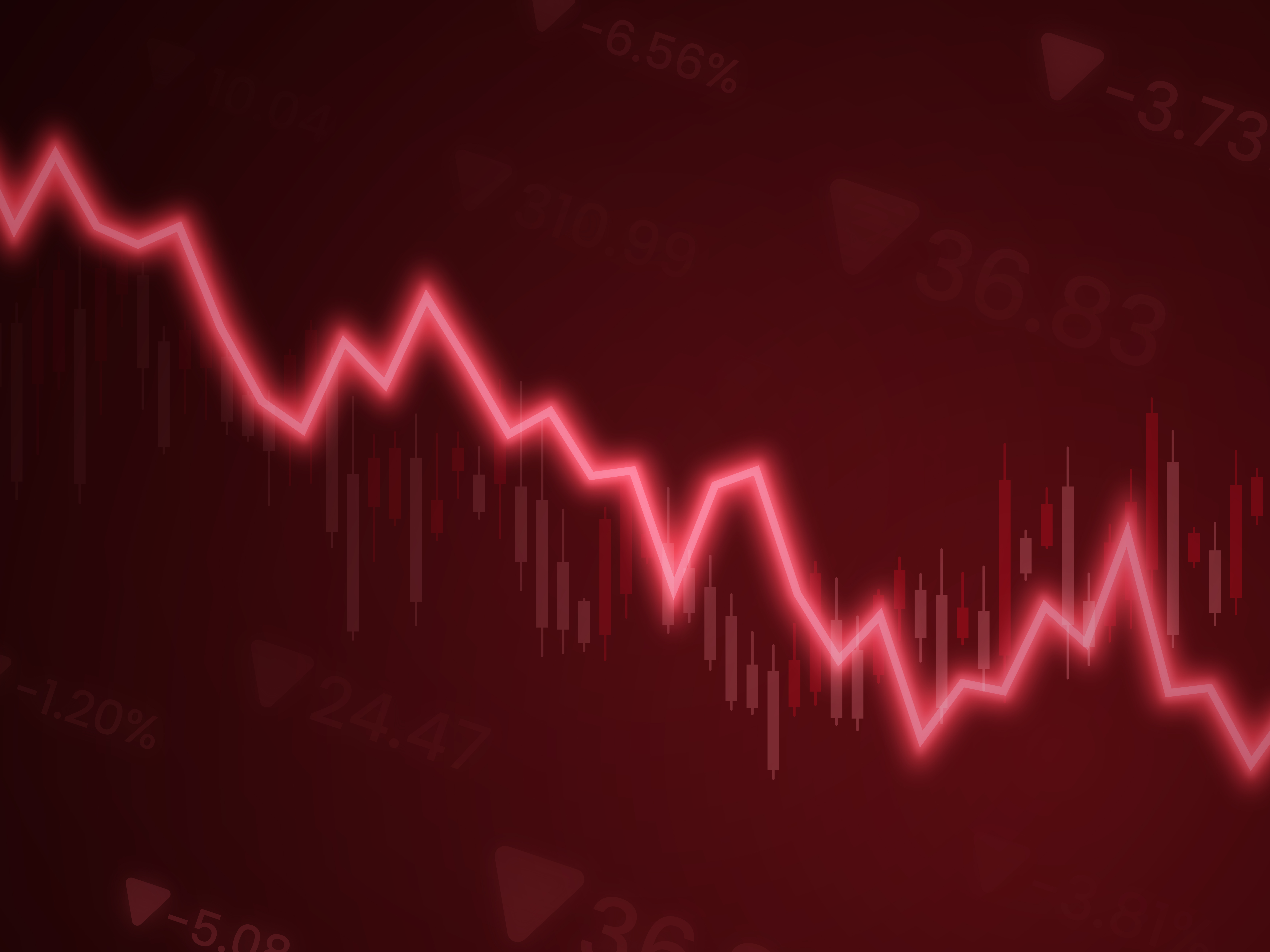 A stock chart line going down.